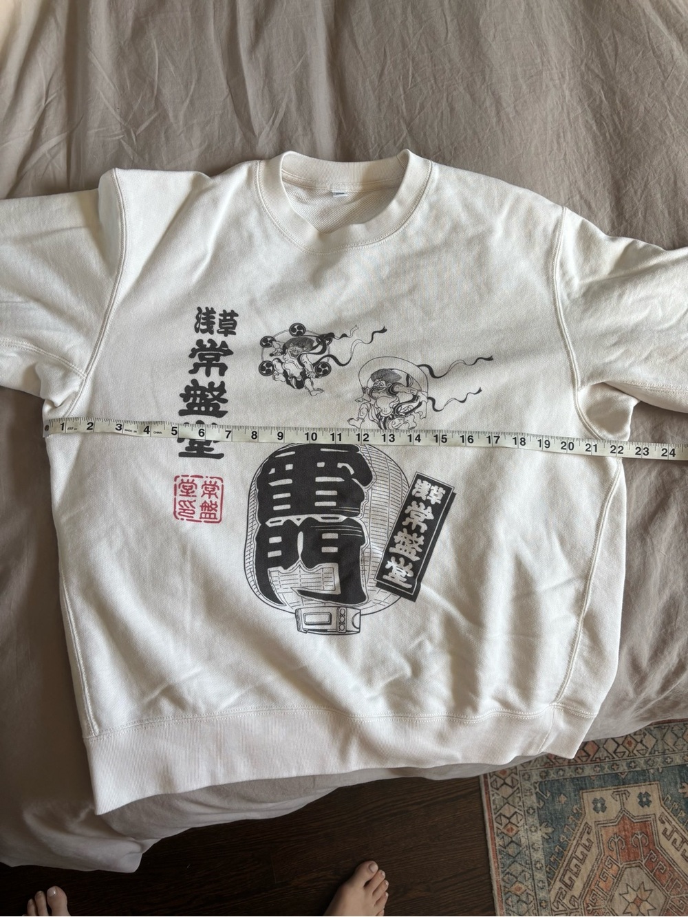 From Uniqlo Tokyo. Cream Graphic Crewneck Sweatshirt
